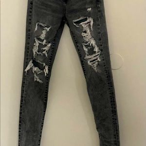 American Eagle next level stretch distressed jeans.